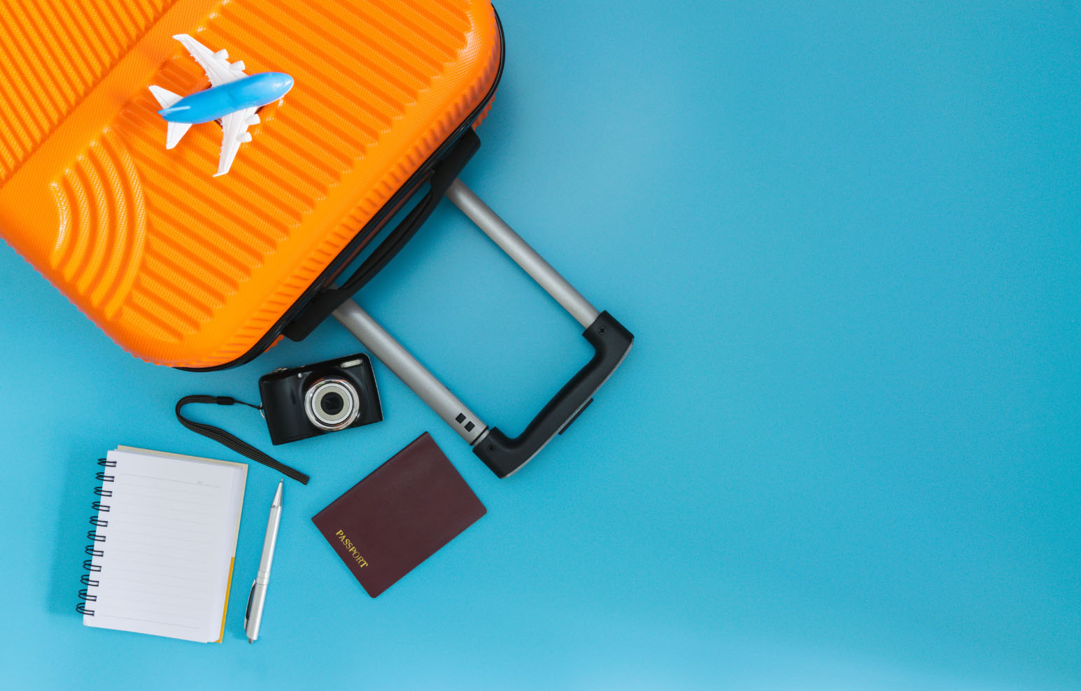 travel orange suitcase